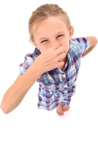 kid pinching nose